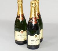 Three bottles of Taittinger non vintage Champagne.