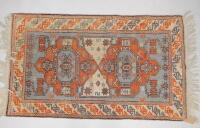 A Turkish bordered rug