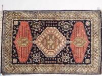 A small Eastern silk rug