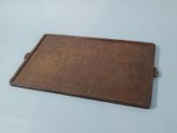 Robert Mouseman Thompson. A rectangular oak tray with a dished top