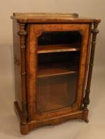 A mid 19thC figured walnut and marquetry music cabinet