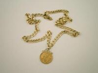 A half gold sovereign pendant and chain