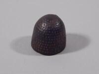 A medieval cast iron thimble