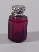 A late 19th/early 20thC ruby tinted glass scent bottle