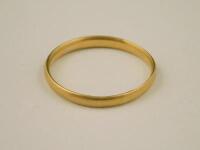 A 22ct gold thin wedding band