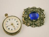 A fob watch and brooch