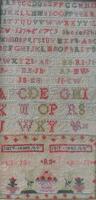 A mid 19thC multi-coloured sampler