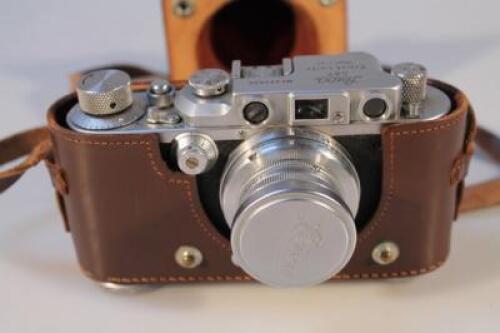 A Leica No. 294020 camera with 50mm Summa lens in fitted case