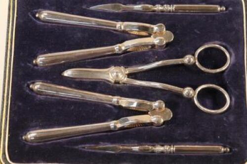 A cased silver plated travelling set