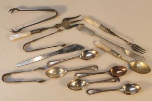 A mother of pearl handled toasting fork together with other mother of pearl and plated cutlery