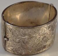 A silver hinged cuff