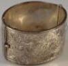 A silver hinged cuff