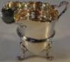 An Edwardian silver cream jug