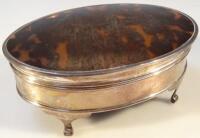 A silver and tortoise shell lidded jar of oval form