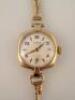 A ladies Picas 9ct gold watch