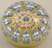 A Whitefriars style floral paperweight