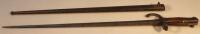 A French 1874 model bayonet with metal scabbard