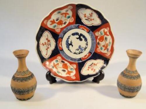 A late 19thC Japanese Imari plate and two Doulton Silicon type vases (3)