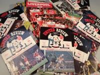 A quantity of various football programmes