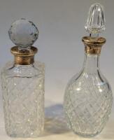 A cut glass decanter and stopper