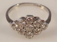 A platinum and diamond cluster ring