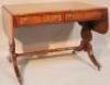 A Regency mahogany drop leaf sofa table with a wide Coromandel cross banding