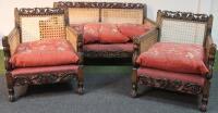 A mid 20thC three piece bergére salon suite