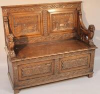 An 18thC style oak monk's bench