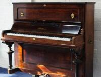 A Bluthner rosewood pianoforte