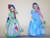 A pair of Royal Doulton figures