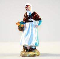 A Royal Doulton figure of 'Country Lass' HN1991. 18cm high.