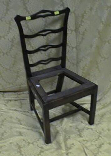 A George III style elm provincial ladderback chair