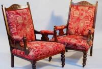 A pair of early 20thC oak upholstered armchairs