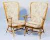 A pair of Ercol upholstered chairs