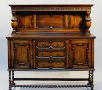 An early 20thC oak Jacobean Revival sideboard