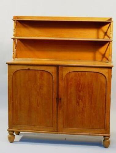 A mid 20thC pine sideboard