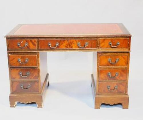 A Victorian style twin pedestal desk