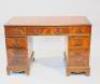 A Victorian style twin pedestal desk