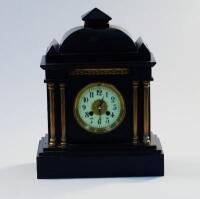 A French style columned mantel clock