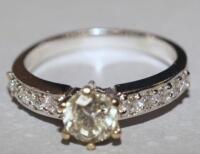 An 18ct gold and 0.75ct diamond ring.