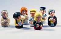 A selection of seven Royal Doulton figures