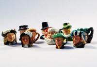 A selection of eight Royal Doulton character jugs