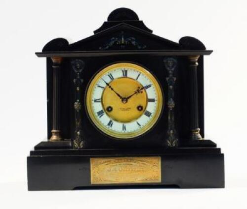 A Victorian slate mantel clock