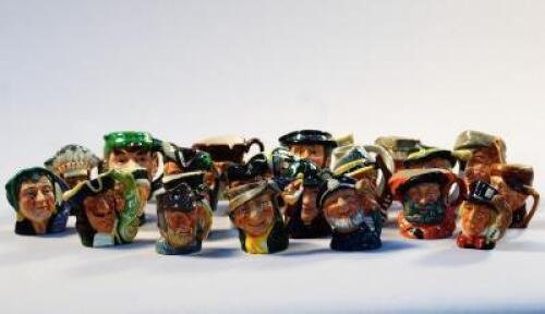 A selection of miniature Royal Doulton character jugs (23).