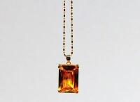 A yellow faceted pendant