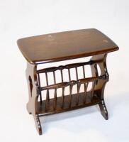 An Ercol Colonial magazine rack