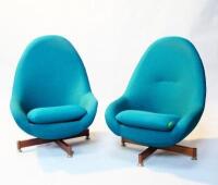 A pair of 1970s easy swivel chairs.