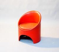 A 1960/70s red vinyl tub chair by Evans Furniture High Wycombe.