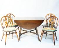 An Ercol dropleaf dining table