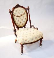 A Victorian mahogany nursing chair